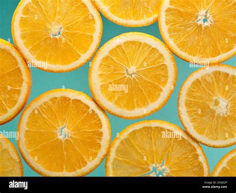 Closeup slice of orange fruit background,pattern background. High ...