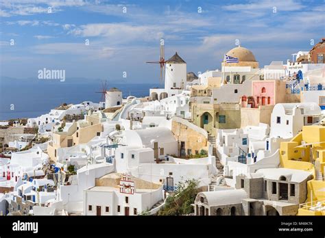 Oia in sunset rays at Santorini, Greece Stock Photo - Alamy