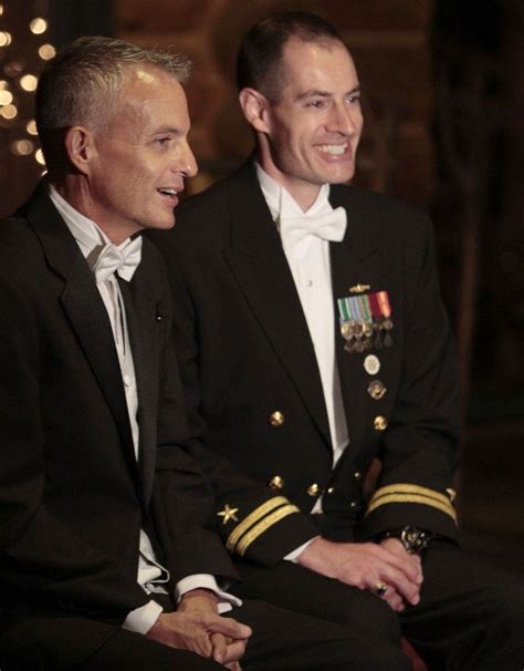 Married gay and lesbian military personnel sue government for same benefits as straight couples ...