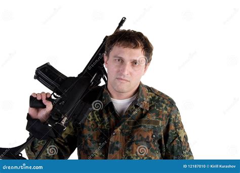 Soldier holding a gun stock photo. Image of camouflage - 12187010