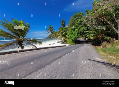 Beach road in tropical island Stock Photo - Alamy