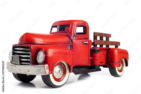 Old truck close-up. Red, vintage, toy truck isolated on white background. Stock Photo | Adobe Stock