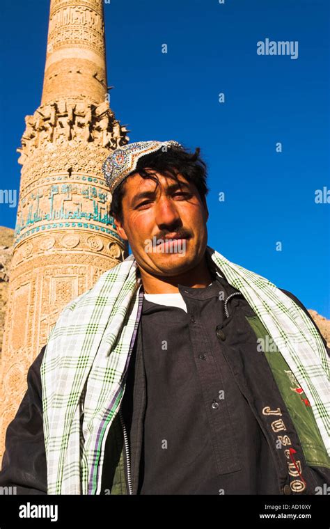 Afghanistan, Ghor Province, Afghani man infront of 12th Century Minaret of Jam Stock Photo - Alamy