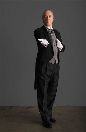 Traditional butler uniform Stock Photos - Page 1 : Masterfile | Butler ...