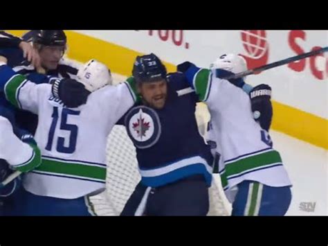 Dustin Byfuglien Takes on Two Canucks - YouTube