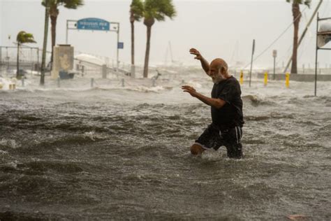 PHOTOS: Helene brings flooding, damage as storm barrels ahead