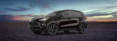 Black 2021 Kia Sportage Nightfall Edition Front Exterior in a Desert