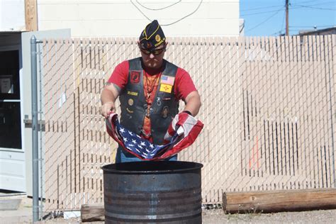 Deming veterans retire flags over fire