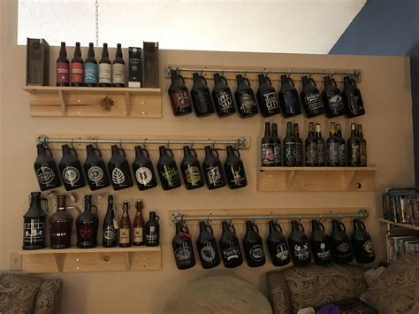 Updated pic for one part of my collection of beer shelves and growler ...