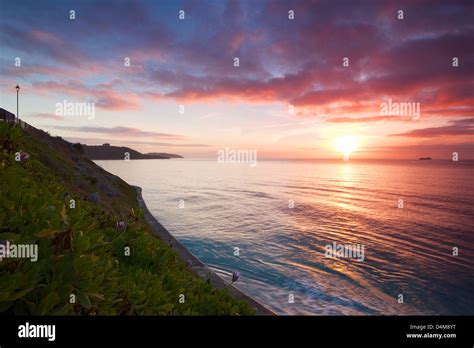 Gyllyngvase beach sunrise Stock Photo - Alamy