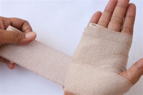 How to Wrap a Wrist (with Pictures) - wikiHow | Sprained wrist, Wrist wrap, Ankle ligaments