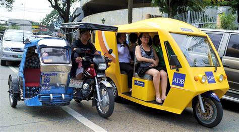 The Philippines is working to incorporate 20,000 electric tricycles into its traffic flow to ...