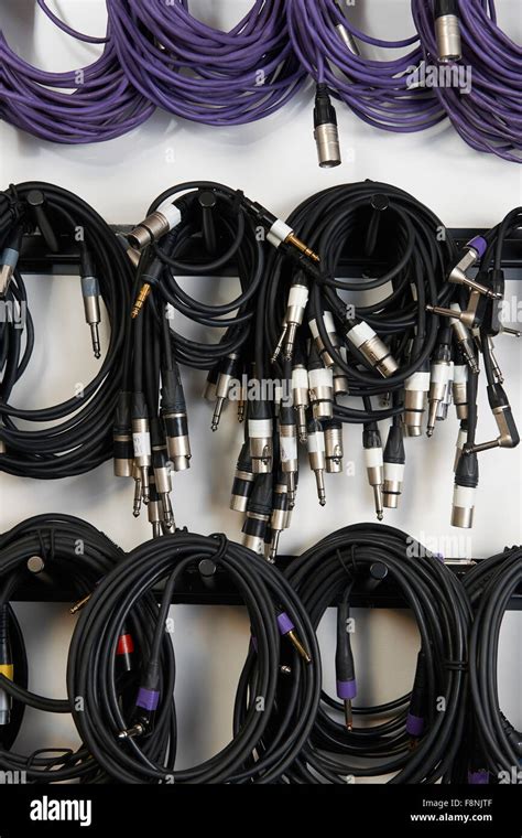 Cables Hanging On Wall Of Recording Studio Stock Photo - Alamy