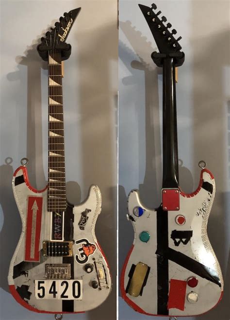 My friend's Frankenstein-esque guitar. Specs in comments : r/guitarporn