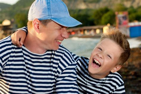 Dad and son stock photo. Image of beach, laughing, summer - 56926088