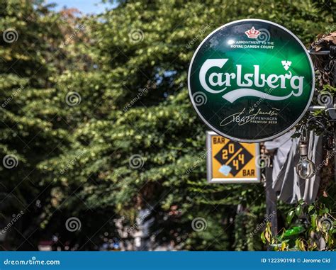 Logo of Carlsberg on a Bar Sign with Its Distinctive Visual. Carlsberg is a Danish Light Pilsner ...