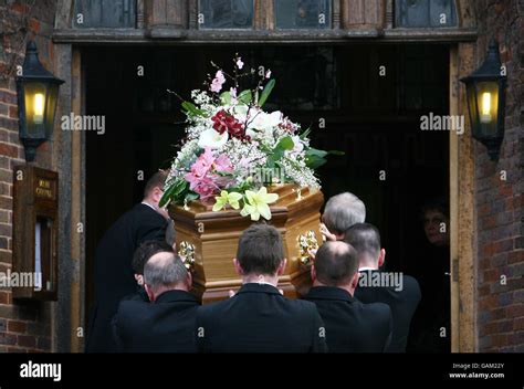 The coffin of former ITN newsreader Carol Barnes is taken into the chapel of Downs Crematorium ...