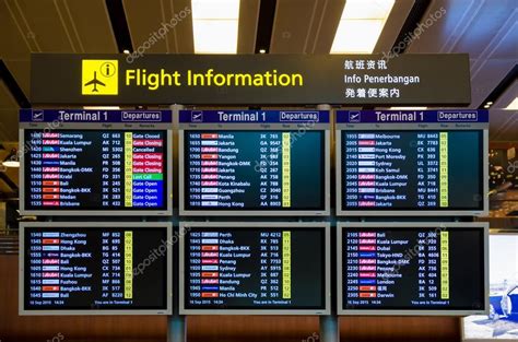 Arrival Departure Board showing departing flights in Changi Airport, Singapore. – Stock ...