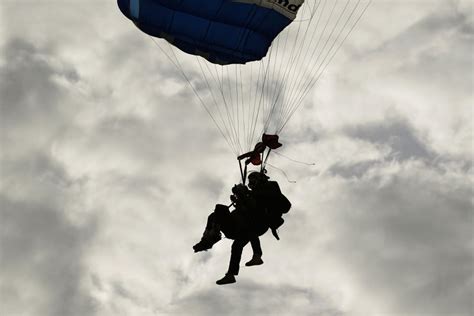 Texas governor skydives for first time alongside 106-year-old World War II veteran