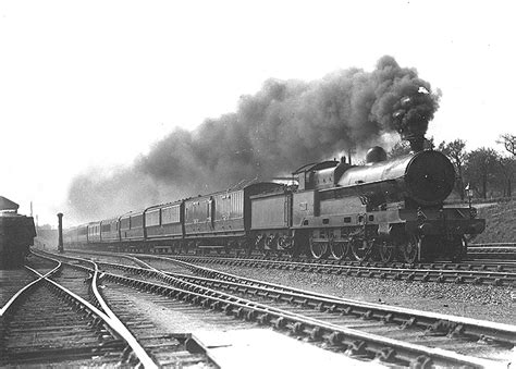 Trent Valley Lineside: An unidentified LNWR 4-6-0 Claughton class locomotive is seen in full ...