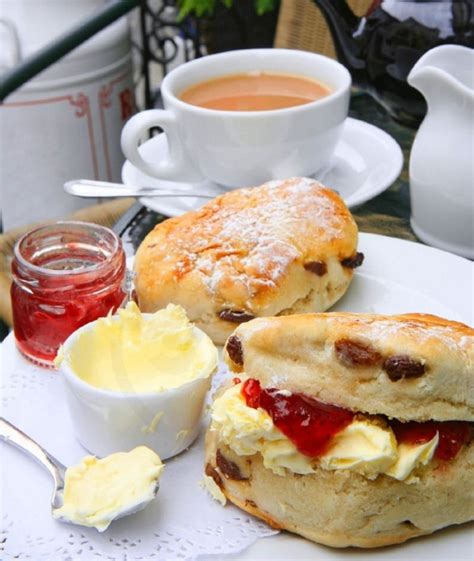 Traditional Devon cream tea with scones, strawberry jam and clotted ...