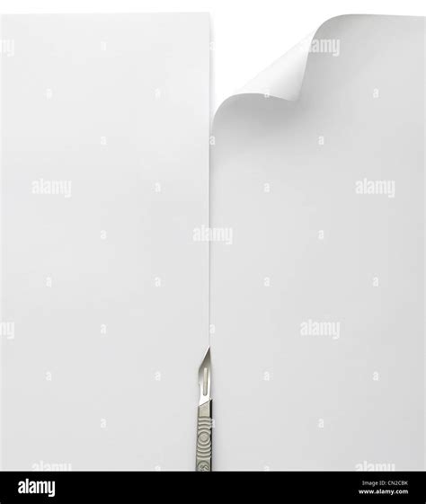 Cut through paper Stock Photo - Alamy