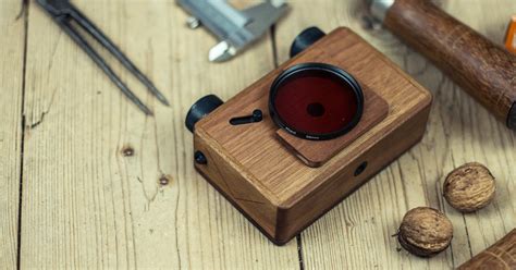 a wooden camera with no lens, no mirror and no batteries