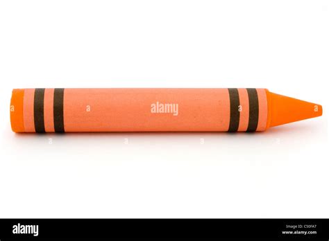 Single orange crayon isolated on a white background Stock Photo - Alamy