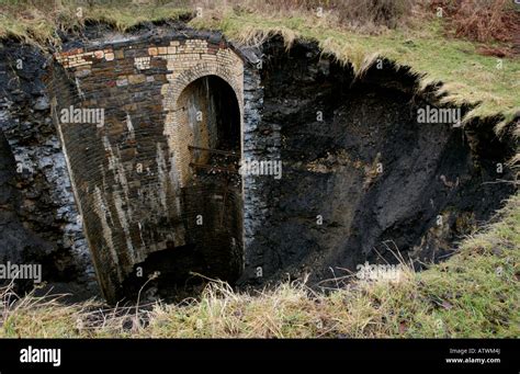 Collapsed mineshaft on development land at Hoel Gerrig Merthyr Tydfil Stock Photo: 16398641 - Alamy