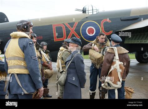 Avro Lancaster bomber crew on Airfield Stock Photo - Alamy