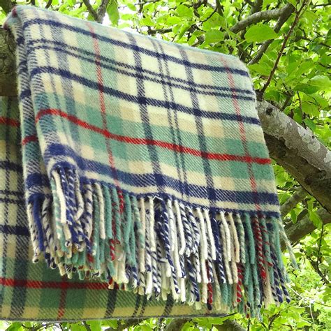 traditional tartan wool blanket by artbox | notonthehighstreet.com