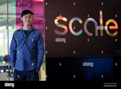 Scale AI founder and CEO Alexandr Wang poses for photos at the company's office in San Francisco ...