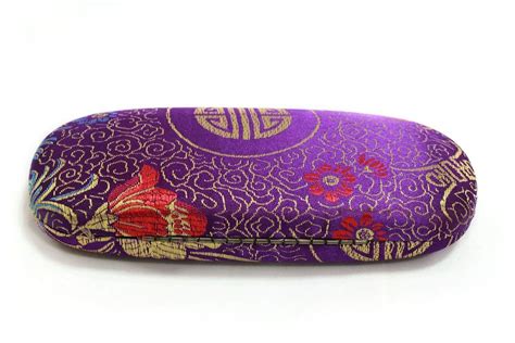 Purple glasses case with flower patterns