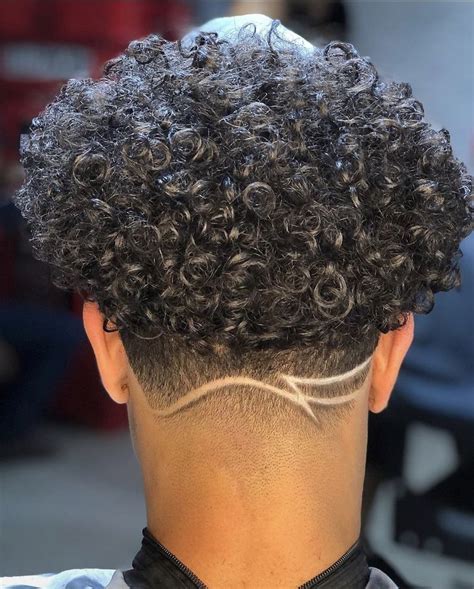 Pin on Taper Fade | Fade haircut designs, Taper fade curly hair, Curly ...