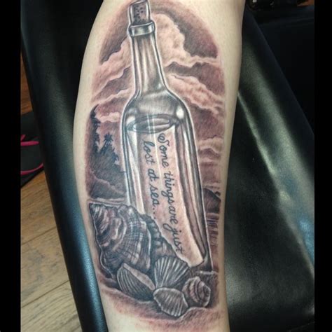 My message in a bottle leg tattoo! | Bottle tattoo, Forearm sleeve tattoos, Realistic owl tattoo