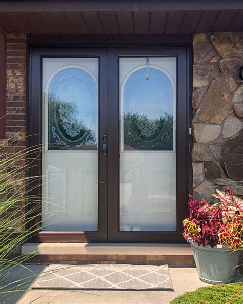 Protect your decorative glass entry door with double storm doors by #ProVia. Recently installed ...