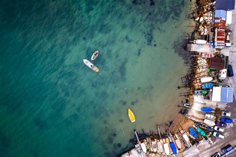 Premium Photo | Top view from drone to the pier and the marina with ...