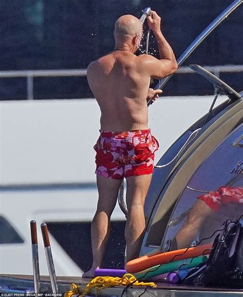 Jeff Bezos, 57, shows off his VERY buff body in the St. Barts with girlfriend Lauren Sanchez ...