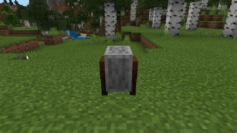 How to make and use a grindstone in Minecraft - Gamepur