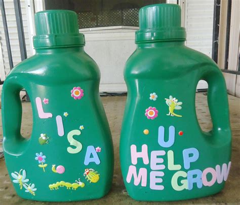 Laundry detergent bottle turned watering can: drill holes in the lid, spray paint , and ...