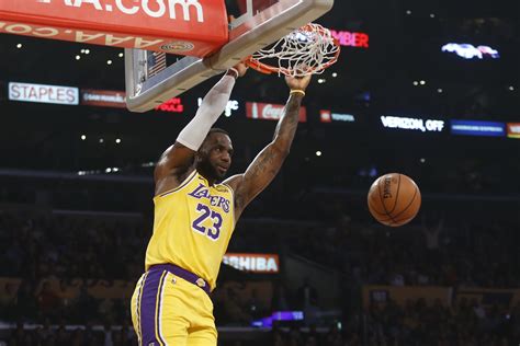 LeBron sets triple-double mark, Lakers hold off OKC 112-107