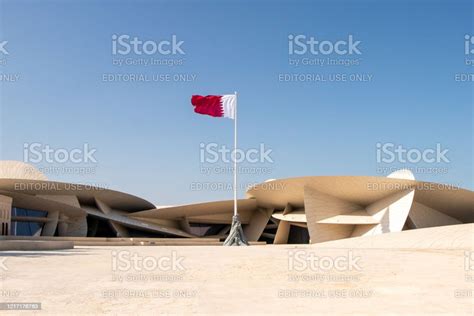 Qatari Flag And Qatar National Museum In Doha Qatar Stock Photo ...