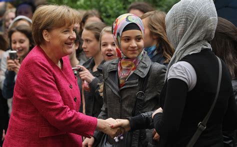 Migrant family names daughter 'Angela Merkel Muhammed' in tribute to German chancellor