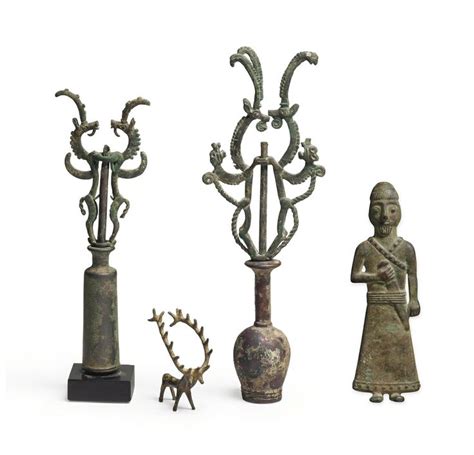 FOUR IRANIAN BRONZE OBJECTS - CIRCA EARLY 1ST MILLENNIUM B.C. | Ancient ...