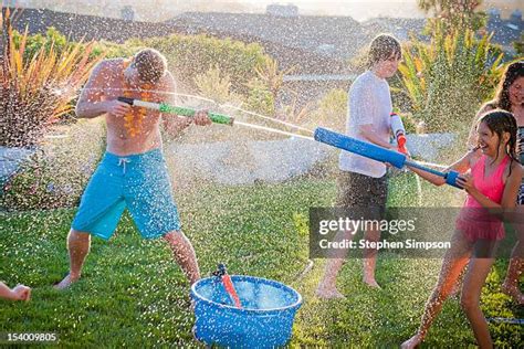 Watergun Fight Photos and Premium High Res Pictures - Getty Images