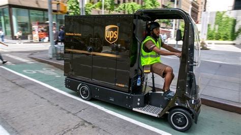 Cycle with four wheels? UPS unveils battery-powered micro delivery vehicle | HT Auto