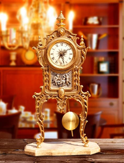 Premium Photo | Ancient vintage brass pendulum clock