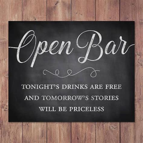 an open bar sign on a wooden wall