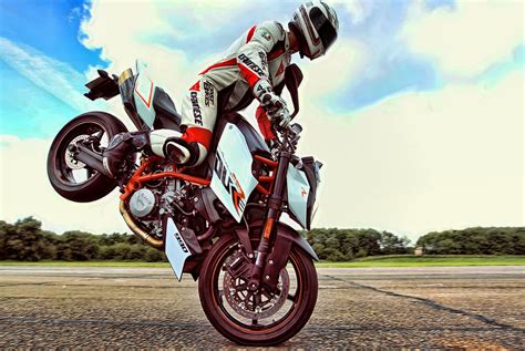 Motorcycle racer doing motorcycle stunt HD wallpaper | Wallpaper Flare