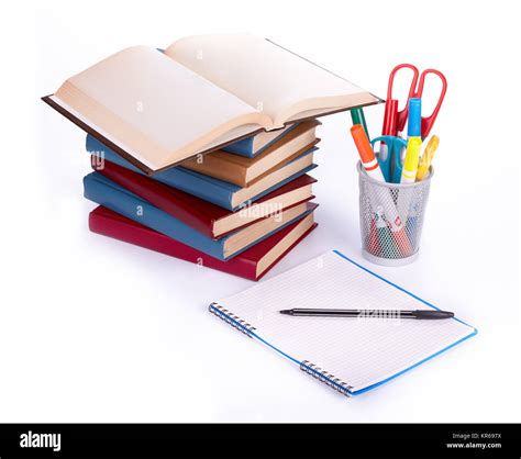 Pile of books, writing-book and pen Stock Photo - Alamy